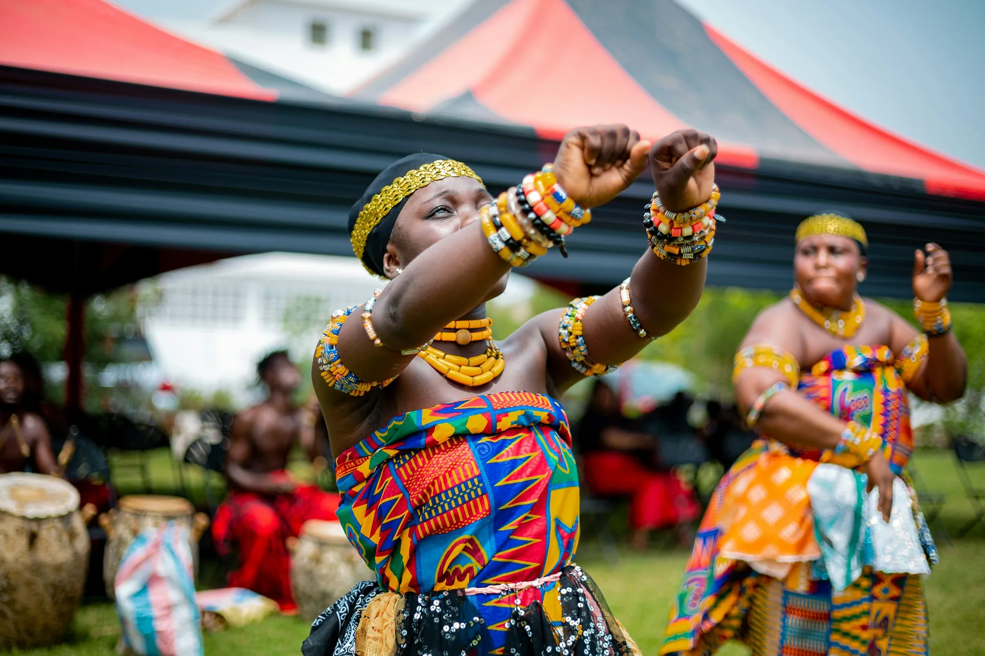 Dancers performing together at a cultural gathering in Accra, Ghana